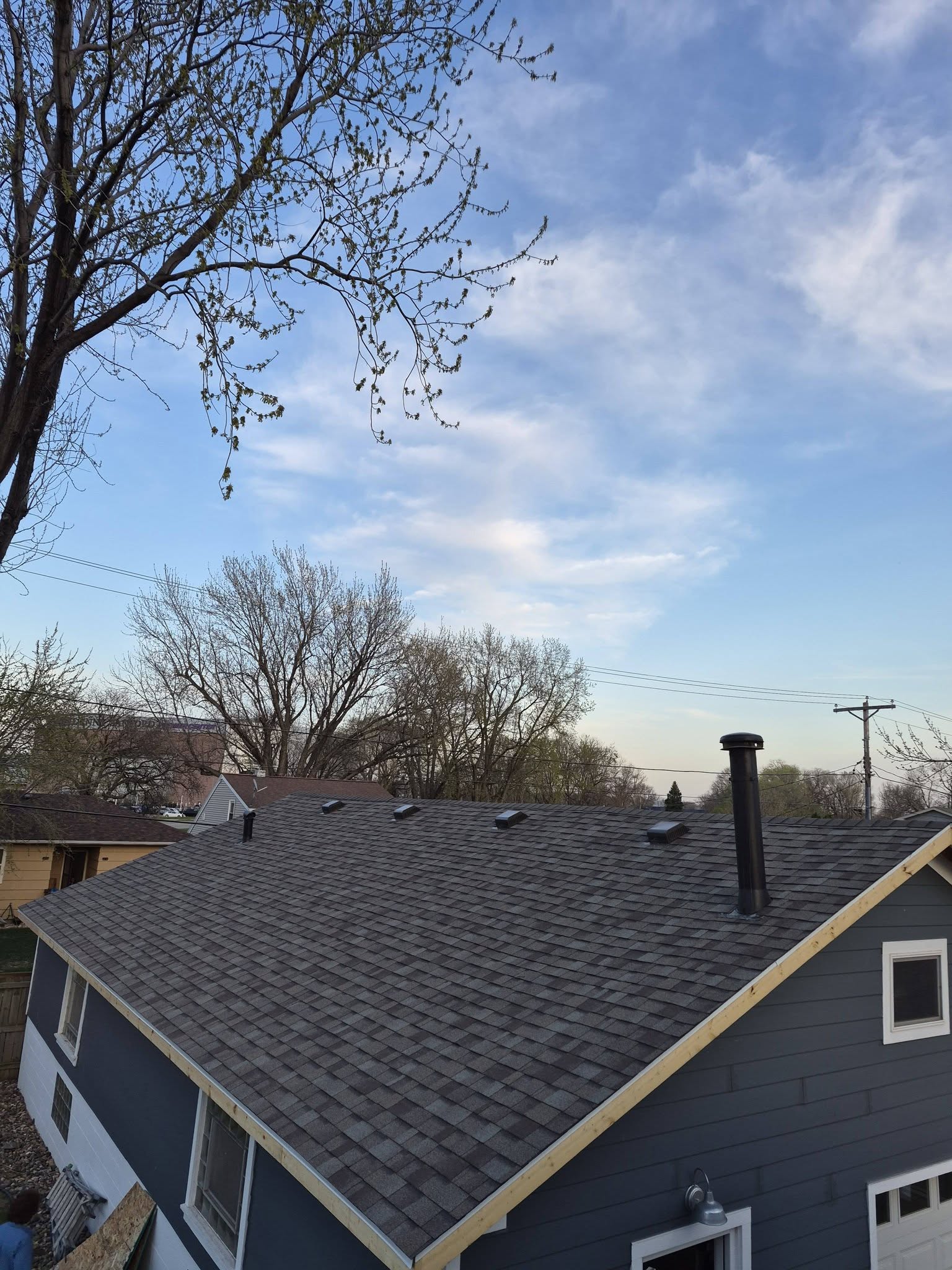 United Roofing & Siding gray shingle roof installation for a residential home in Sioux Falls, SD