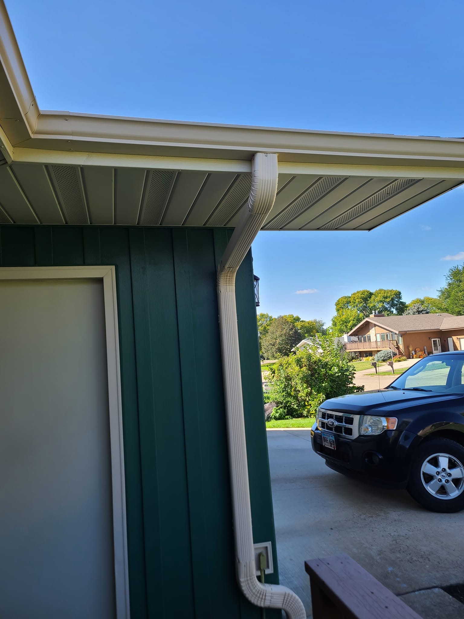 United Roofing & Siding gutter downspout installation for residential homes in Sioux Falls, SD