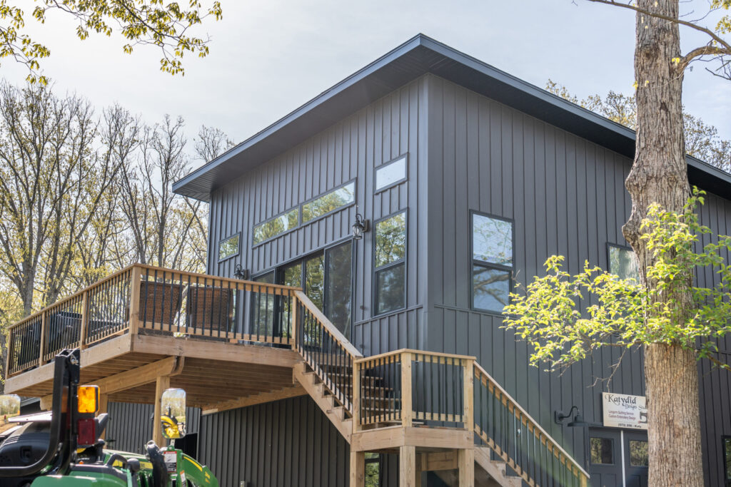 United Roofing & Siding vertical metal siding installation for a modern residential home in Sioux Falls, SD